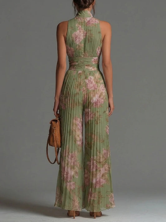 Charlotte™ | Flödande plisserad jumpsuit med gröna blommor