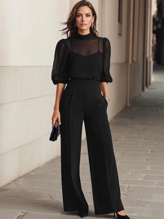 Valentina™ | Conjunto de dos piezas en negro, compuesto por un top sin mangas transparente y unos pantalones de pierna ancha
