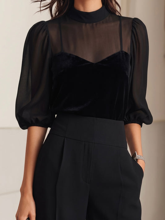 Valentina™ | Conjunto de dos piezas en negro, compuesto por un top sin mangas transparente y unos pantalones de pierna ancha