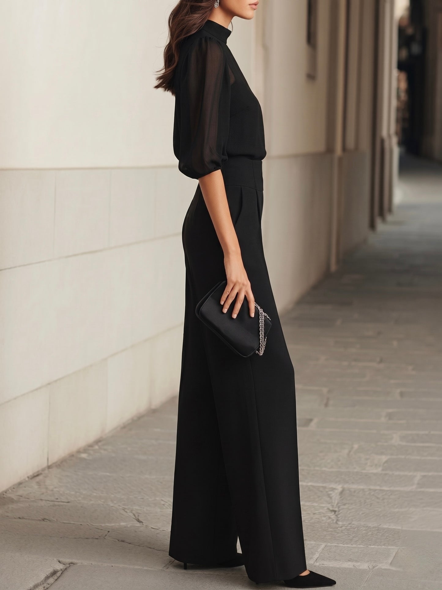Valentina™ | Conjunto de dos piezas en negro, compuesto por un top sin mangas transparente y unos pantalones de pierna ancha